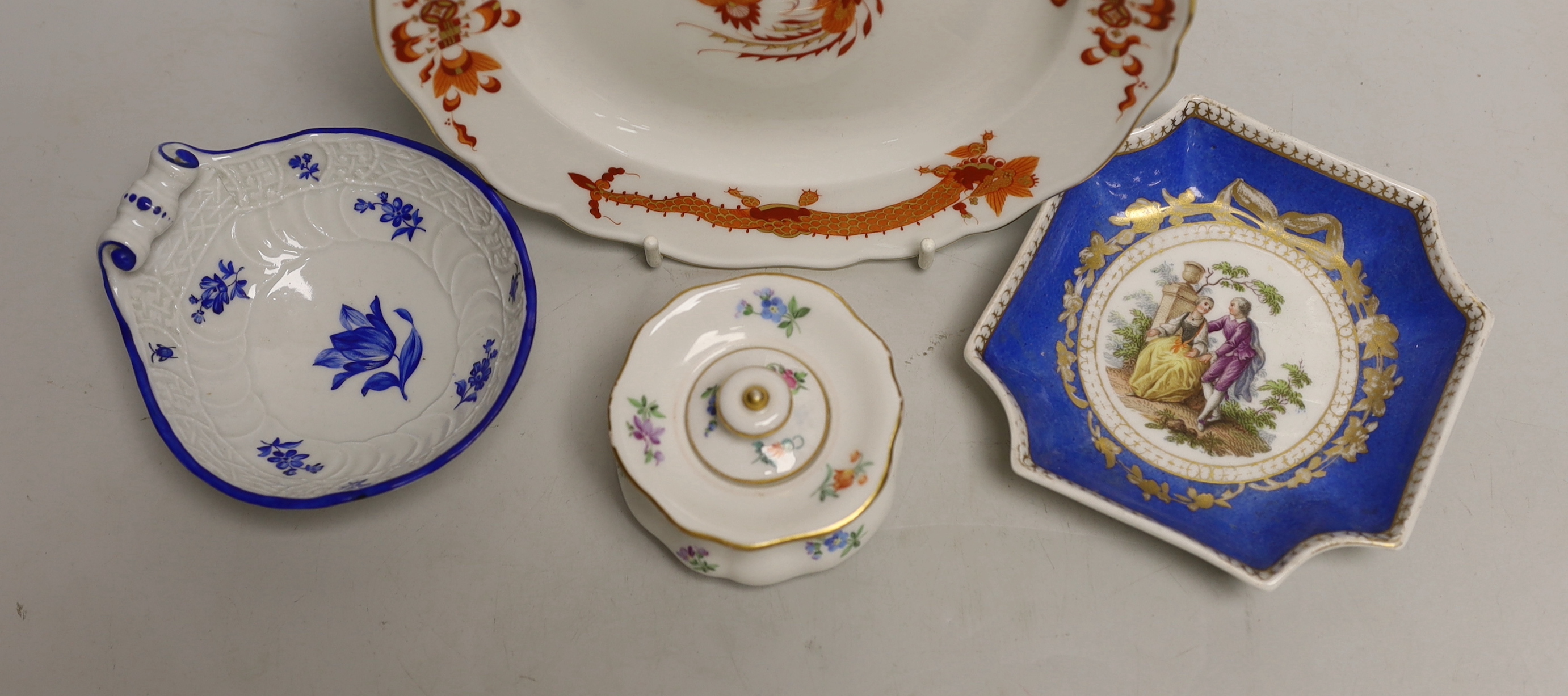 Four Meissen porcelain items including a plate, two small outside decorated dishes and a miniature lidded pot, plate 18cm